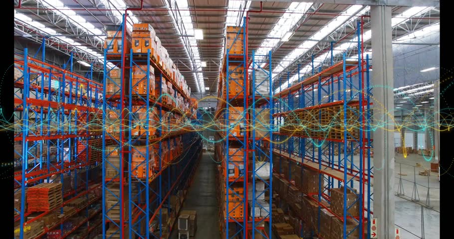 Camera entering aisle of racks storing orange crates, projecting waveforms mapping data into bay. Logistics, warehouse, automation, digital, scanning, industrial, inventory