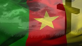 Gentle breeze starting Cameroon flag rippling across hill revealing sky behind cross silhouette. Patriotism, nationalism, tranquility, symbolism, nature, monument, serenity - Powered by Shutterstock - Get 15% off with code: PIKWIZARD15