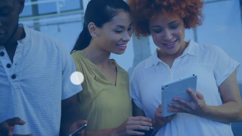 Three colleagues glancing at devices, causing floating icons and nodes connecting into tech network. Collaboration, connectivity, innovation, teamwork, digital, communication, modern - Powered by Shutterstock - Get 15% off with code: PIKWIZARD15