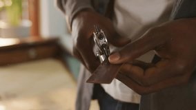 Man opening folio on table and sparking data nodes around smartphone for tech network visualization. Technology, connectivity, innovation, digital, networking, communication, business - Powered by Shutterstock - Get 15% off with code: PIKWIZARD15