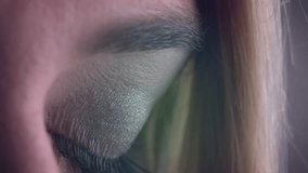 Closed eyelid opening, woman's iris glowing cyan as holographic code flickering for virtual scan. Futuristic, cybernetic, technology, digital, high-tech, innovation, sci-fi - Powered by Shutterstock - Get 15% off with code: PIKWIZARD15