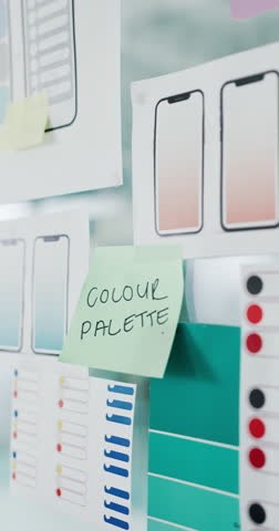 Glass, wireframe and paperwork with sticky notes in office for UX design, UI layout and prototype. Interface planner, color palette and information for user experience, site aesthetic and typography