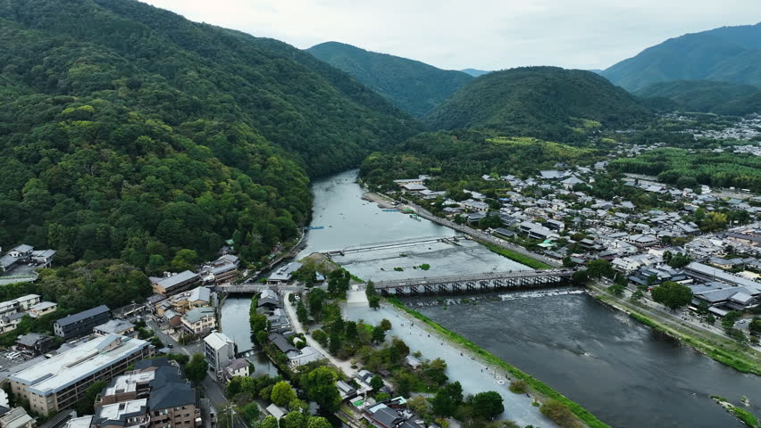 Panoramic Aerial View Of Togetsukyo Bridge Across The Katsura River In Arashiyama, Ukyo Ward, Kyoto, Japan.