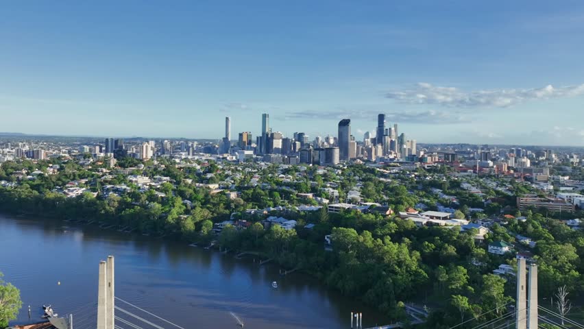  A collection of diverse aerial and time-lapse views of Brisbane, Queensland, Australia.Footage includes panoramic shots of the CBD skyline across the Brisbane River from various angles,