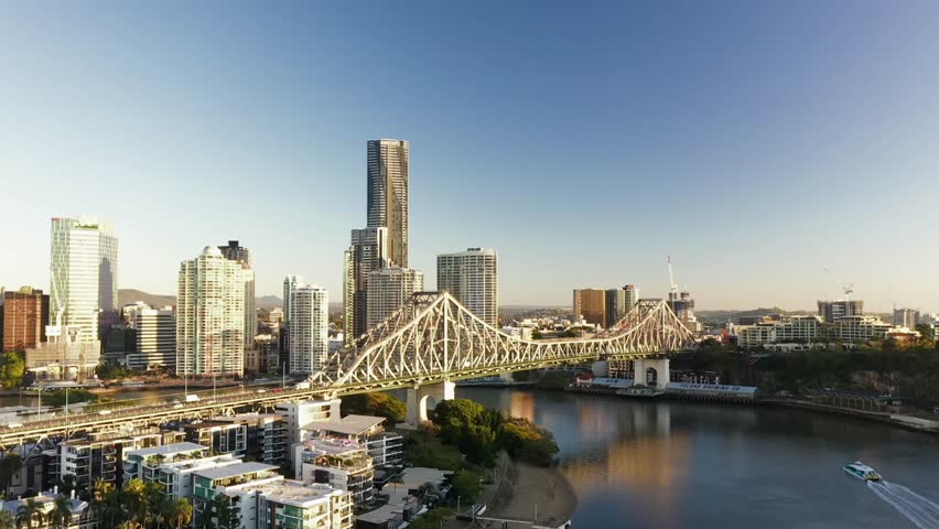  A collection of diverse aerial and time-lapse views of Brisbane, Queensland, Australia.Footage includes panoramic shots of the CBD skyline across the Brisbane River from various angles,