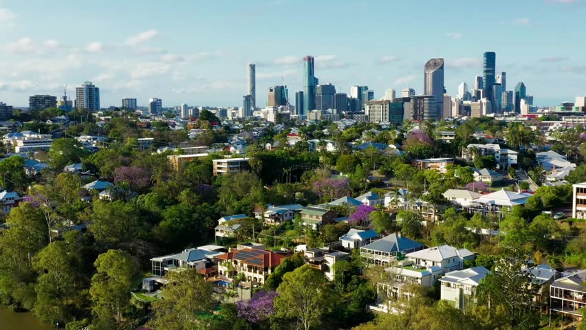  A collection of diverse aerial and time-lapse views of Brisbane, Queensland, Australia.Footage includes panoramic shots of the CBD skyline across the Brisbane River from various angles,