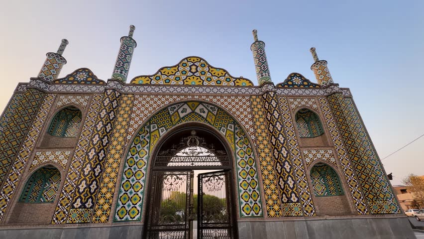 Ancient brick gate in historic landmark located in Tehran Iran Islamic architecture featuring archway minaret cobblestone street medieval fortress urban culture tourists sightseeing travel destination