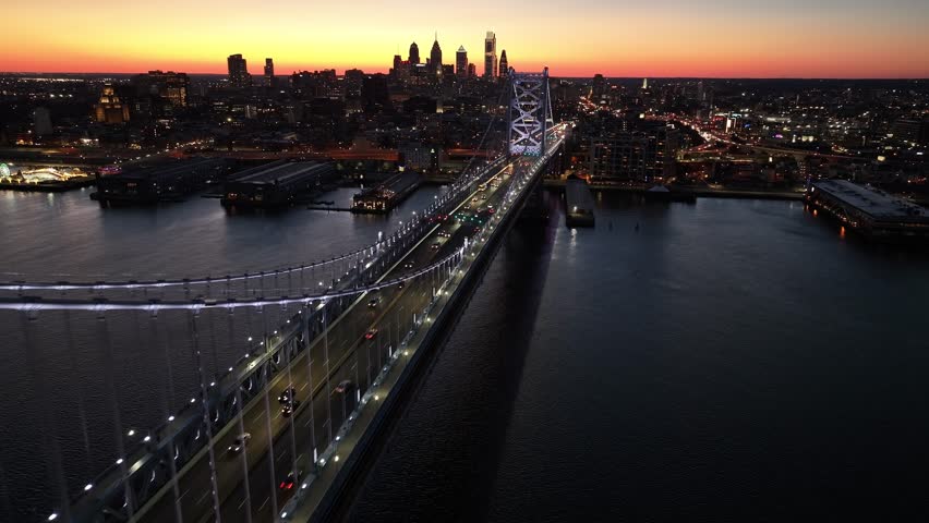 Sunset Skyline In Benjamin Franklin Bridge At Philadelphia In Pennsylvania United States. Highrise Buildings Landscape. Colorful Sunset. Philadelphia At Pennsylvania United States.
