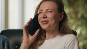 Laughing happy Caucasian business woman girl answering mobile phone call at home smiling female businesswoman talking smartphone answer cellphone chatting with friends conversation indoor office house - Powered by Shutterstock - Get 15% off with code: PIKWIZARD15