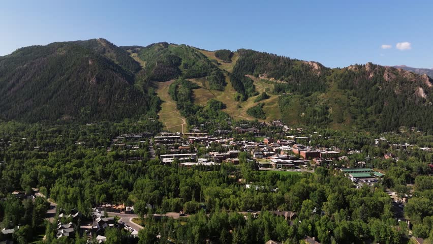 Cinematic Establishing Drone Shot Above Aspen, Colorado. Forward Dolly Shot