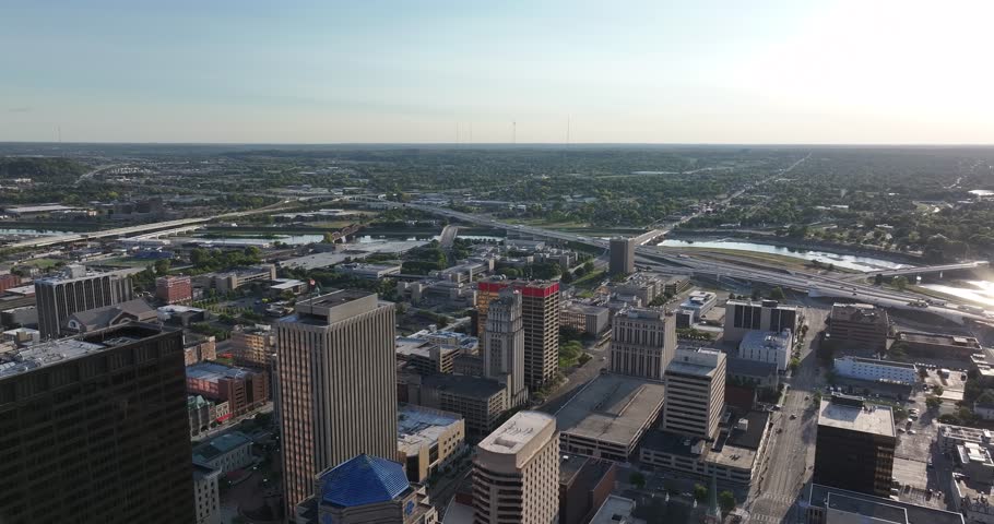 Aerial view of buildings and roads in Dayton, with contrasting light and shadows, showcasing architectural diversity and urban planning, Dayton, Ohio, United States.