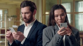 Multiethnic office business coworkers Korean businesswoman Caucasian businessman typing mobile phone focused digital smartphone teamwork concentration technology online networking browsing internet - Powered by Shutterstock - Get 15% off with code: PIKWIZARD15