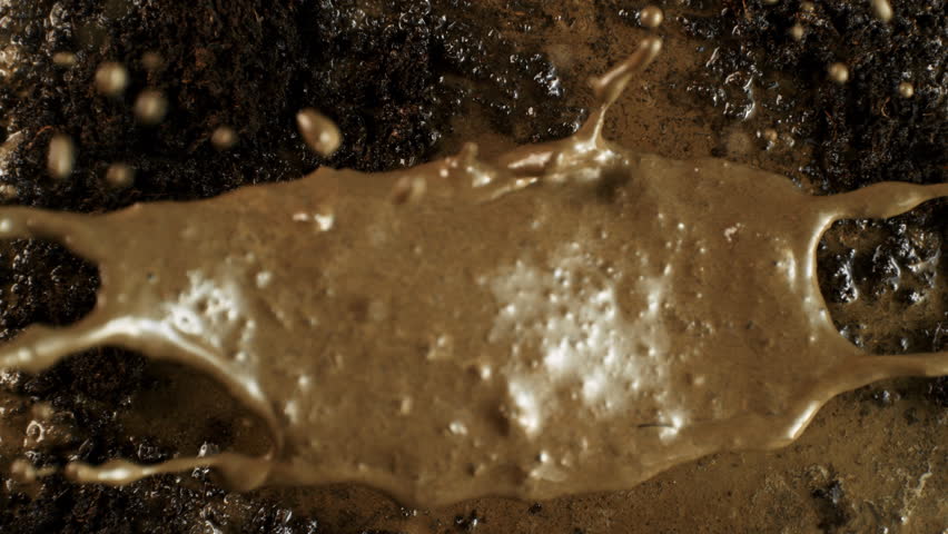 Super Slow Motion Shot of Splashing Mud Background at 1000fps.