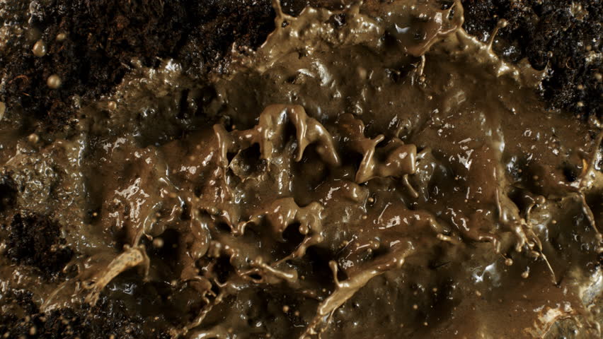 Super Slow Motion Shot of Splashing Mud Background at 1000fps.
