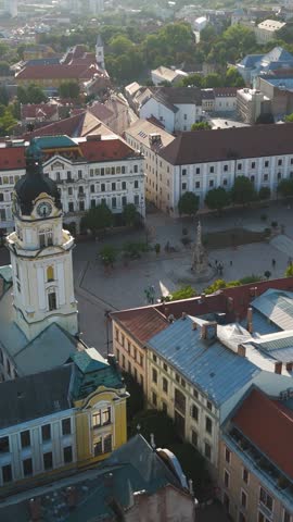 Széchenyi Square with surrounding architecture in Pécs, Hungary. Vertical view