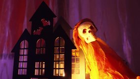 As night falls on Halloween, shadows dance in a candle-lit castle. A ghostly figure looms, while eerie light illuminates the windows, creating a spine-chilling atmosphere. Skull, skeleton in a rag - Powered by Shutterstock - Get 15% off with code: PIKWIZARD15