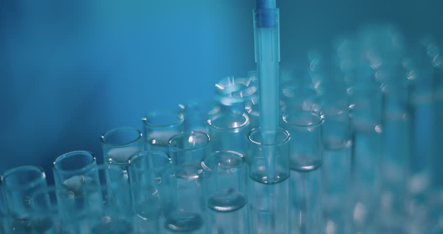 Test tube, science and pipette at lab with liquid, chemical and process for pharmaceutical solution. Container, medical research and study with tools, closeup and virus dna for vaccine development