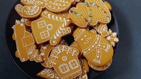 Colorful iced Christmas cookies in holiday shapes like trees, stars, and snowmen, decorated with sprinkles and festive designs for seasonal celebrations. - Powered by Shutterstock - Get 15% off with code: PIKWIZARD15