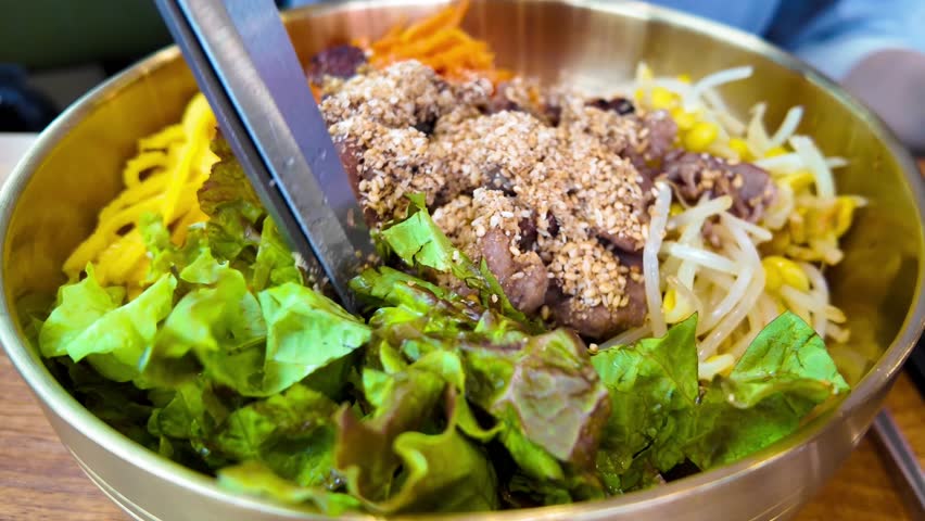 Bibimbap, Korean spicy salad with rice bowl, bulgogi. Traditionally Korean food