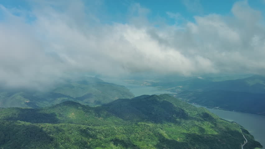 Aerial view on the Danube river and mountains under clouds in Djerdap National Park, Serbia Romania border, 4k