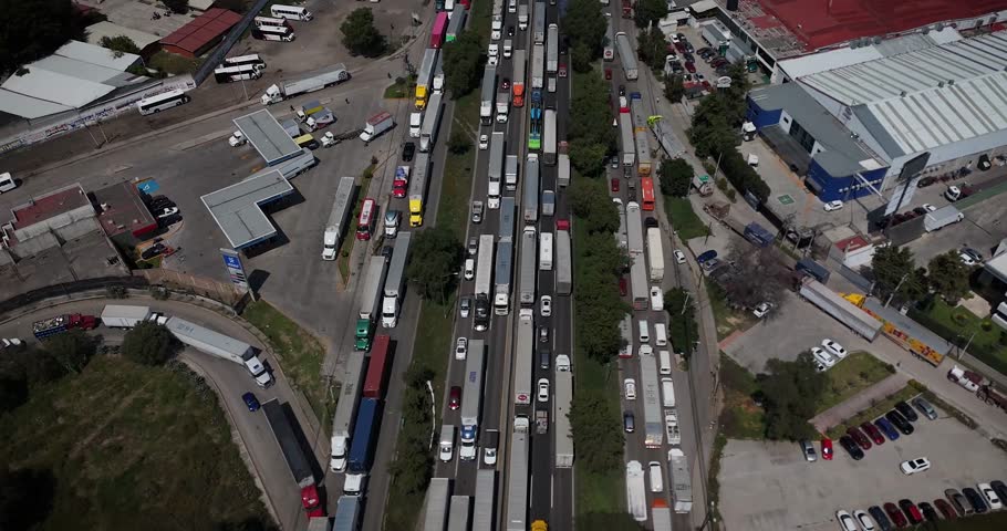 Aerial static drone footage showing heavy traffic congestion on the Mexico–Querétaro Highway within the Mexico City metropolitan area, highlighting urban mobility and transportation density