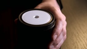 Female hand sticking pencil into automatic electric pencil sharpener and sharpening it close-up side view. Office stationery tool. Preparation for drawing and sketching. High quality 4k footage. - Powered by Shutterstock - Get 15% off with code: PIKWIZARD15