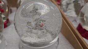 The snow globe with house model and christmas tree inside. Christmas themed background - Powered by Shutterstock - Get 15% off with code: PIKWIZARD15