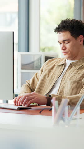 Phone, break and business man in office, reading email and bored copywriter check review online. Lazy content writer, mobile and scroll article, newsletter or disinterested with creative information