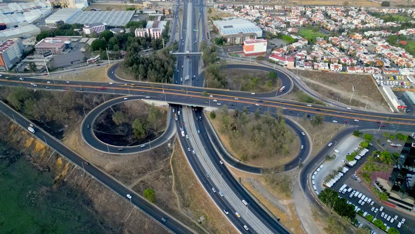 Drone captures static top-down view of highway interchange between Peripheral and Vallarta Avenue