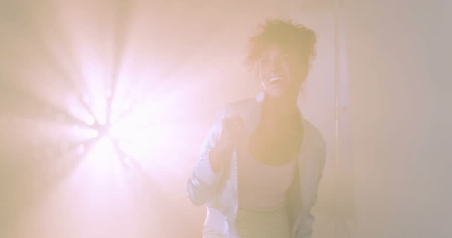 woman stepping into pink haze activating glass board materializing math diagrams teaching math. Educator, science, innovation, clarity, motivation, visualization, educational