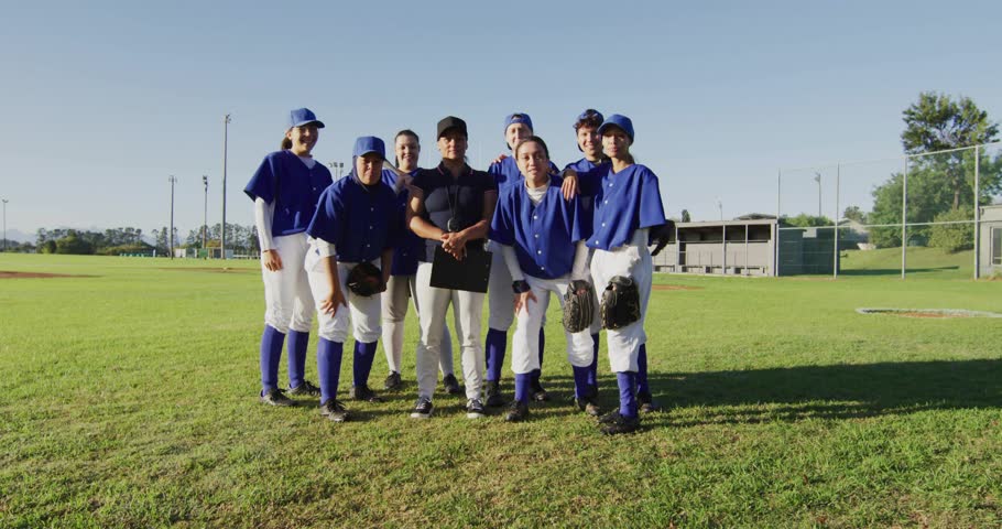 Baseball team shifting on coach signaling, raising gloves as neon wave swirling at feet celebrating. Sports, teamwork, celebration, vibrant, energy, motion, unity