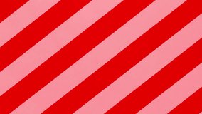 Unwrapping gift revealing a green screen - Stop Motion Animation - Red and pink Christmas wrapping paper.  - Powered by Shutterstock - Get 15% off with code: PIKWIZARD15