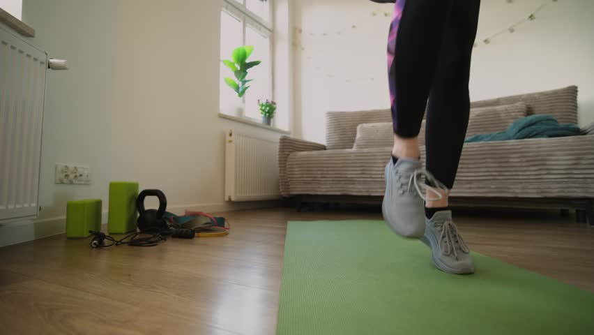 Girl Running In Place At Home During A Workout