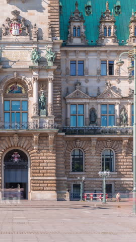 Entrance to the building of the Hamburg City Hall timelapse, the seat of the government of Hamburg, located in the Altstadt quarter in the city center. Front view from the main square