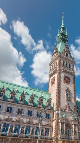 Building of the Hamburg City Hall timelapse, the seat of the government of Hamburg, located in the Altstadt quarter in the city center. Front view from the main square under a cloudy sky