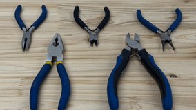 Work tools such as screwdrivers, cutters, or pliers are depicted symbolically. A craftsman's workplace. - Powered by Shutterstock - Get 15% off with code: PIKWIZARD15