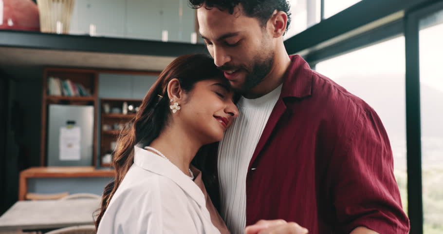 Dance, relax and love with couple in living room for support, celebration and happiness. Music, smile and trust with man and woman hugging in home for wellness, commitment and marriage together