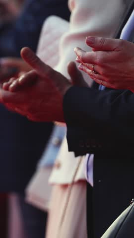 Actors, celebrities and stars on red carpet, guests and fans cheer an clapping hands, welcome, applause and ovation on cinema movie premiere, film festival award ceremony, ropes and golden barriers