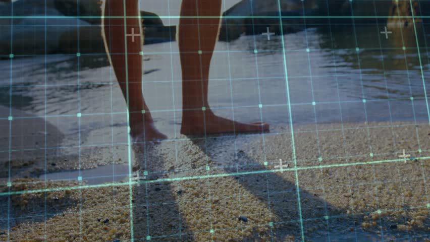 Man shifting weight for testing shallow water depth near posts while tech grid scanning wet pebbles. Seaside, footprints, aquatic, modern, leisure, exploration, nature