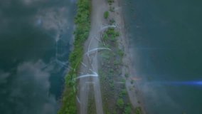 Upon start, green-blue neon arcs swirling over land strip forming pulsing ring, revealing EVIDENCE. Aerial, abstract, digital, futuristic, technology, data visualization, urban - Powered by Shutterstock - Get 15% off with code: PIKWIZARD15