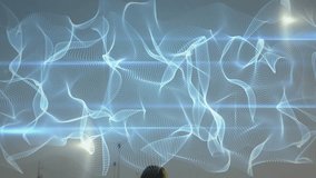 Camera tilting down showing woman tracking shifting light ribbons on pier for tech demo. Abstract, digital art, futuristic, serenity, contemplative, ambient, minimalism - Powered by Shutterstock - Get 15% off with code: PIKWIZARD15