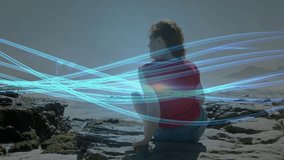 Woman sitting on ledge viewing blue light bands appearing, converging on horizon showing tech flow. Adventure, tranquility, digital art, nature-inspired, sunset, contemplative, futuristic - Powered by Shutterstock - Get 15% off with code: PIKWIZARD15