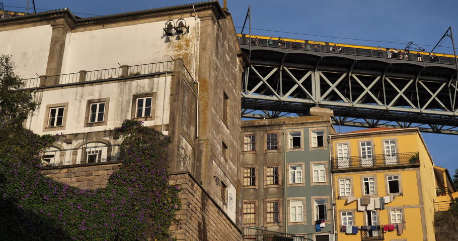 Traditional buildings and Dom Luiz I bridge, Ribeira, Porto, Portugal.