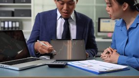 Business team discusses startup strategy with investor using tablet, laptop, and smartphone. - Powered by Shutterstock - Get 15% off with code: PIKWIZARD15
