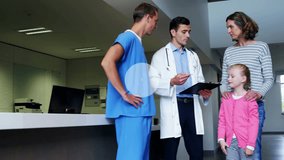 Doctor swiping tablet and initiating data graphics forming around group consulting health records. Healthcare, digital, technology, communication, professionalism, innovation, patientcare - Powered by Shutterstock - Get 15% off with code: PIKWIZARD15