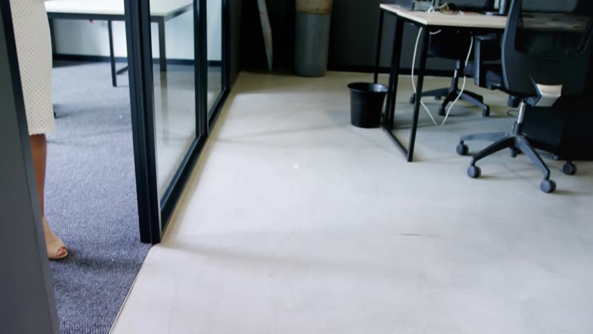 Office worker with coffee, phone walking glass corridor, tapping Subscribe and Message Sent icons. Professional, connectivity, digital, communication, urban, networking, modern - Powered by Shutterstock - Get 15% off with code: PIKWIZARD15