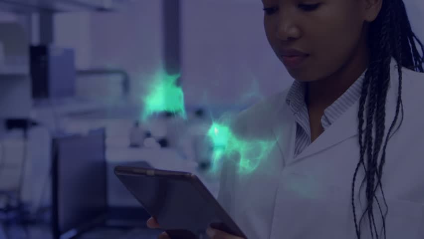Lab technician raising tablet and summoning holographic sphere fragmenting strands into dual arcs. Futuristic, innovation, data, visualization, technology, science, analysis - Powered by Shutterstock - Get 15% off with code: PIKWIZARD15
