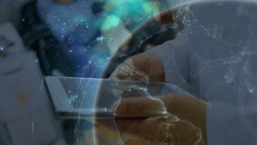 Doctor tapping touchscreen device and activating rotating globe animation calling waiting patient. Medical, technology, interface, digital, healthcare, innovation, communication - Powered by Shutterstock - Get 15% off with code: PIKWIZARD15