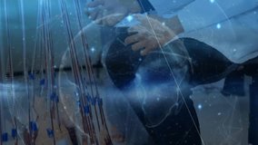 Lab technician kneeling testing harness with probe while colleague tracing cables with data overlay. Technology, collaboration, precision, innovation, diagnostics, laboratory, calibration - Powered by Shutterstock - Get 15% off with code: PIKWIZARD15