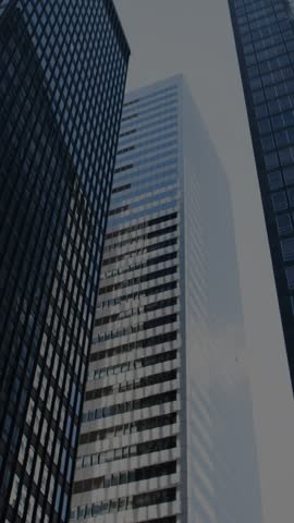 Animation of bar graph over skyscrapers in urban cityscape displaying data. Analytics, business, finance, modern, growth